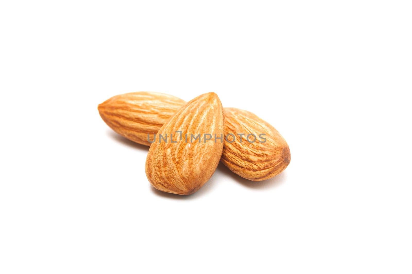 Fresh almond isolated on white background. Food and healthy conc by kirisa99