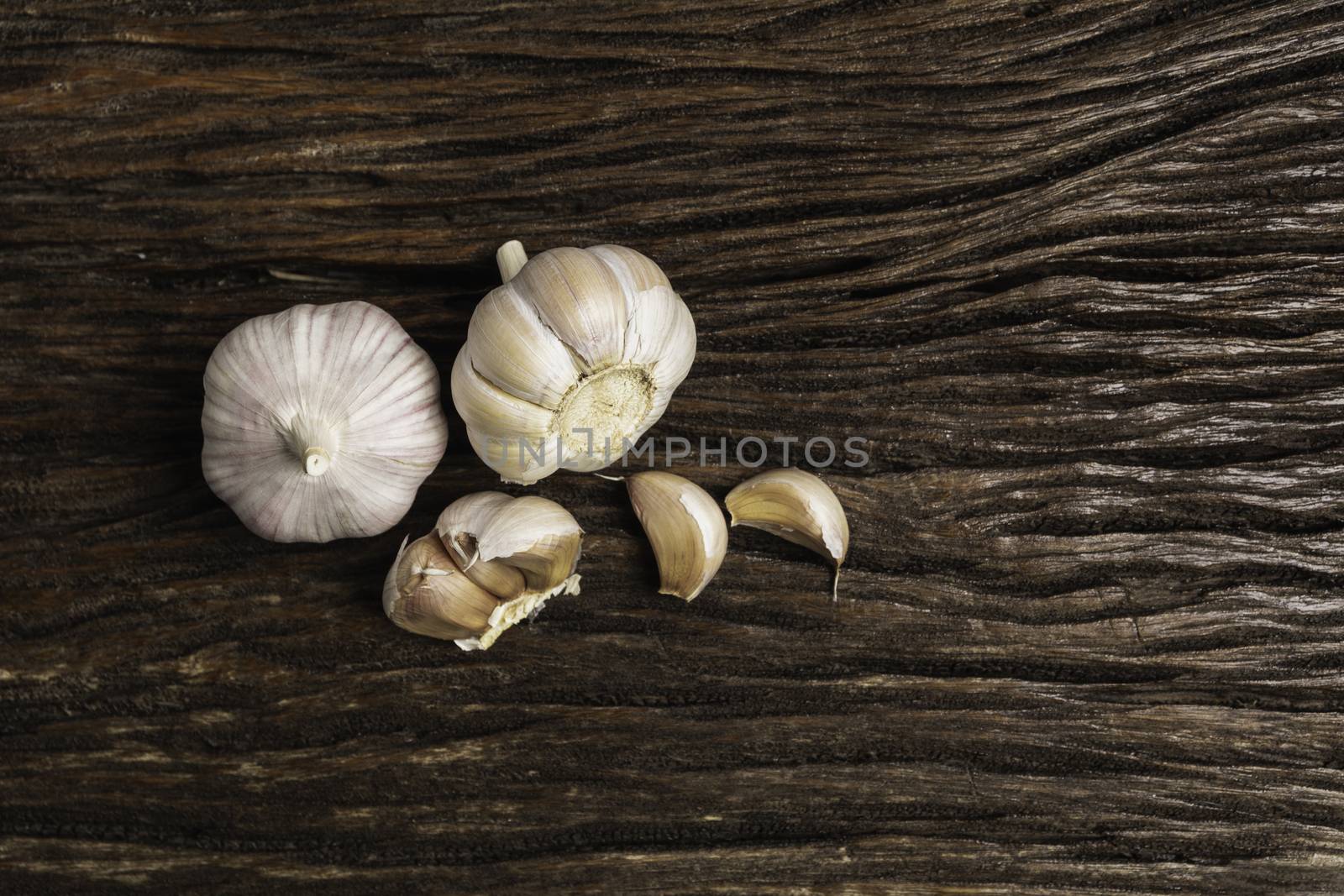 Fresh Garlic sliced and garlic bulb with copy space concept of food and healthy.