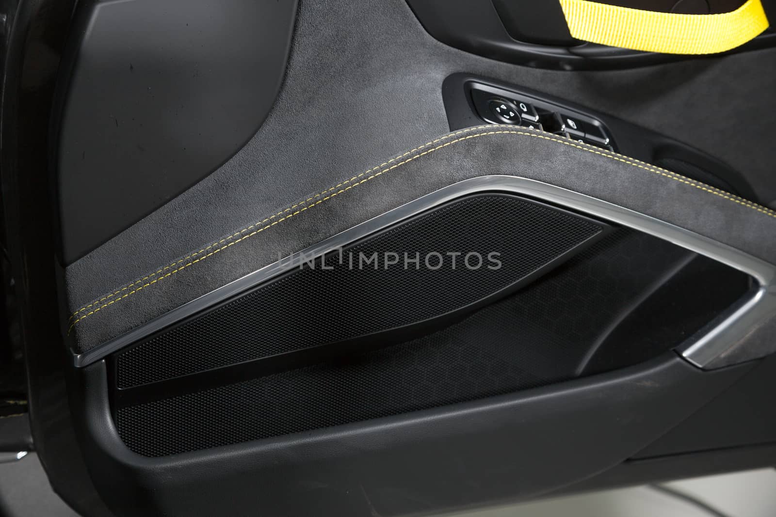 Shot of door panel in car interior by camerarules