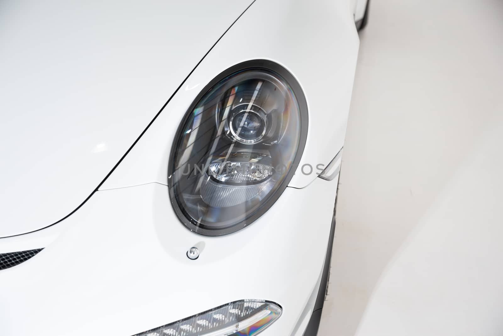 Detail shot of car headlight by camerarules