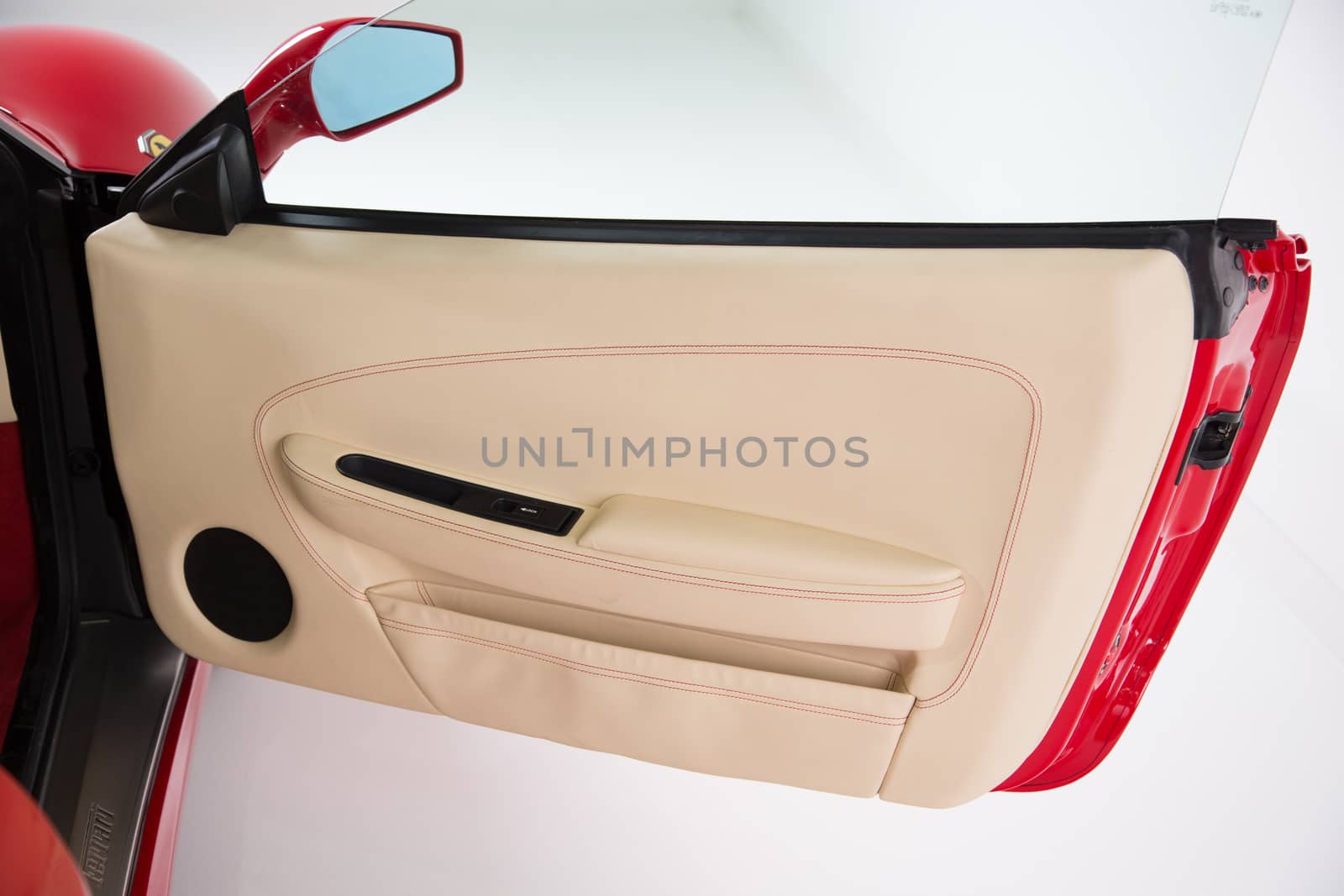 Car door panel in light cream leather trim