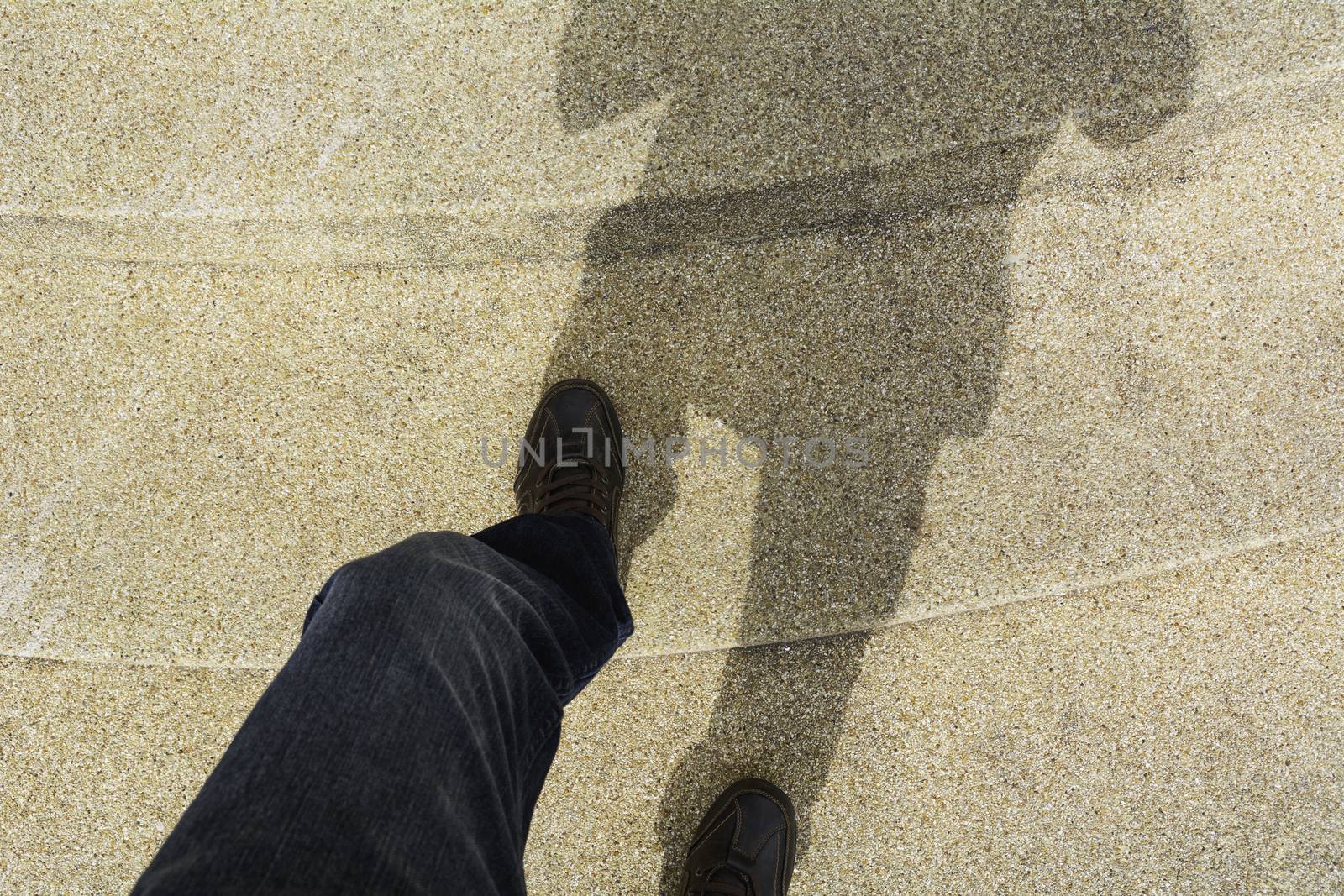 Close up and top view of man shoes walking. by kirisa99