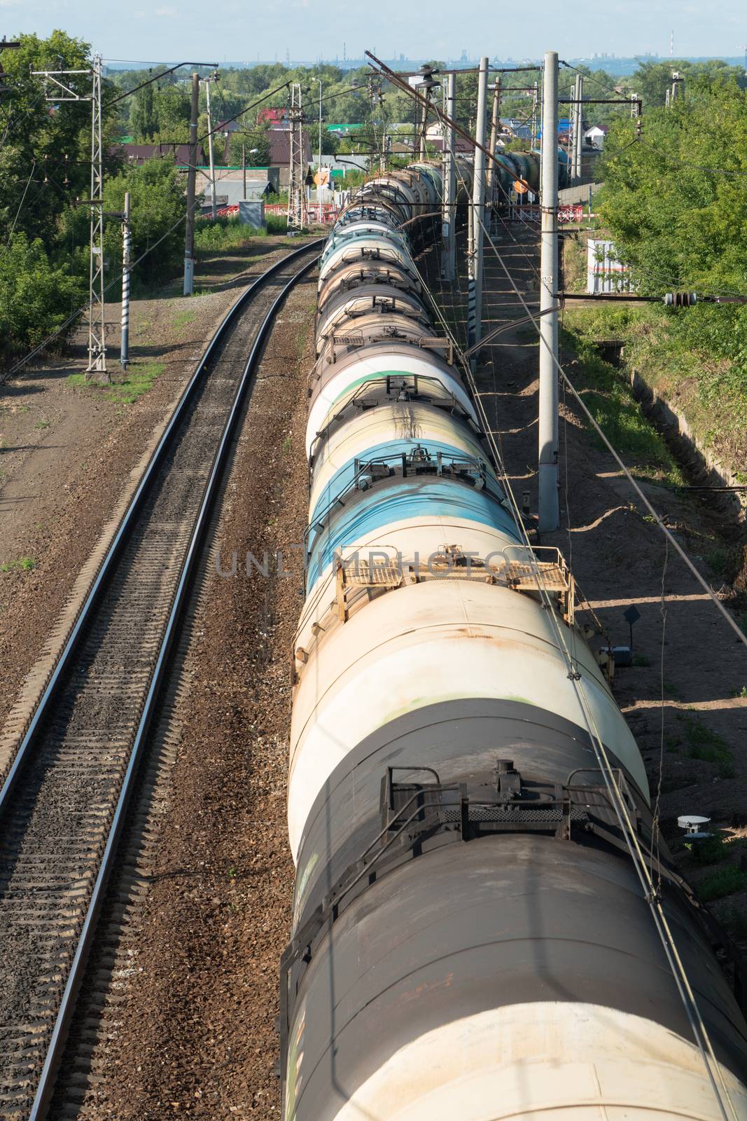 train with tank cars on the railroad tracks, top view