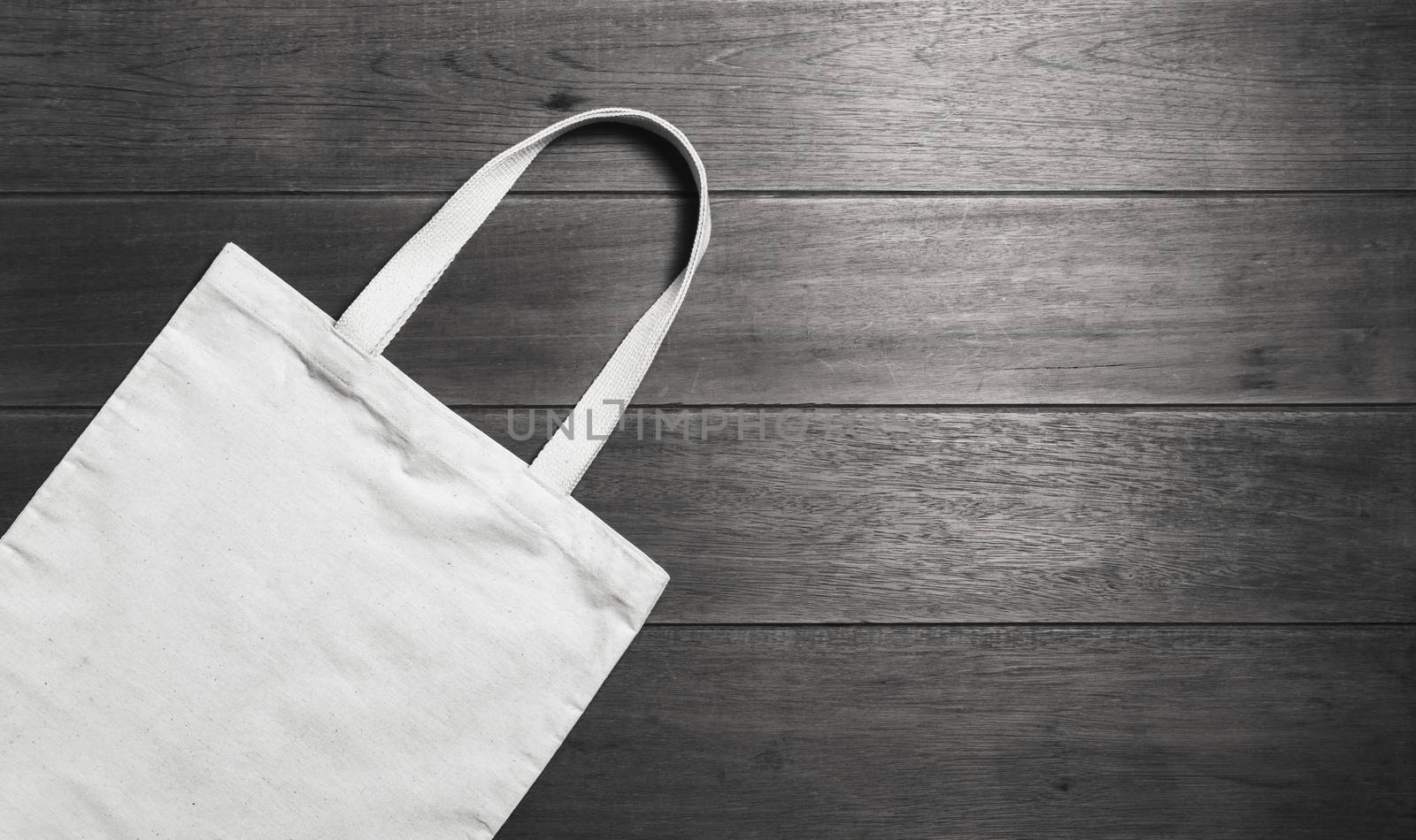 White tote bag canvas fabric. Cloth shopping sack mockup with copy space.