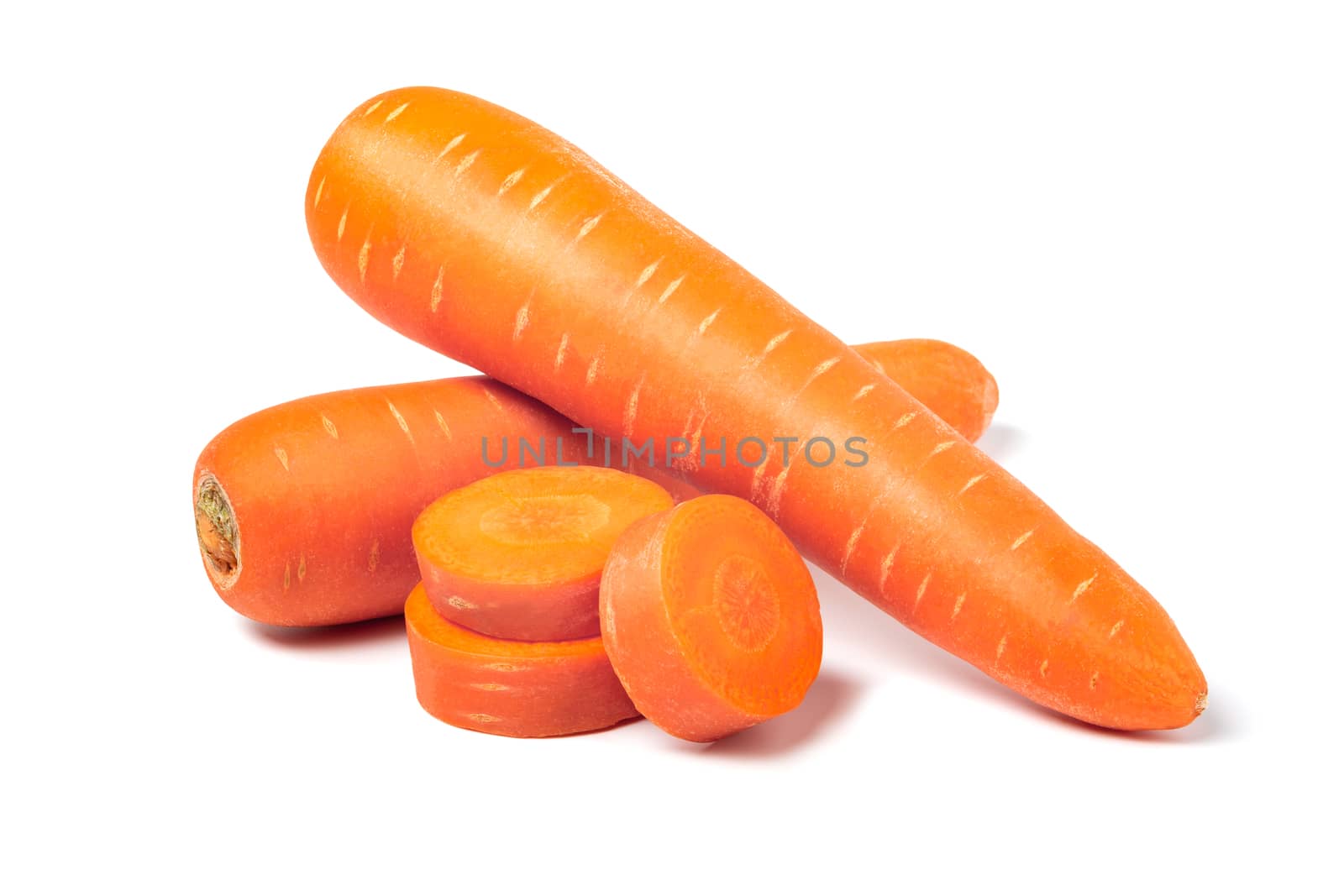 Fresh carrots isolated on white background. Close up of carrots.