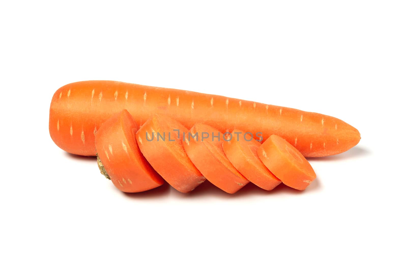 Fresh carrots isolated on white background. Close up of carrots.