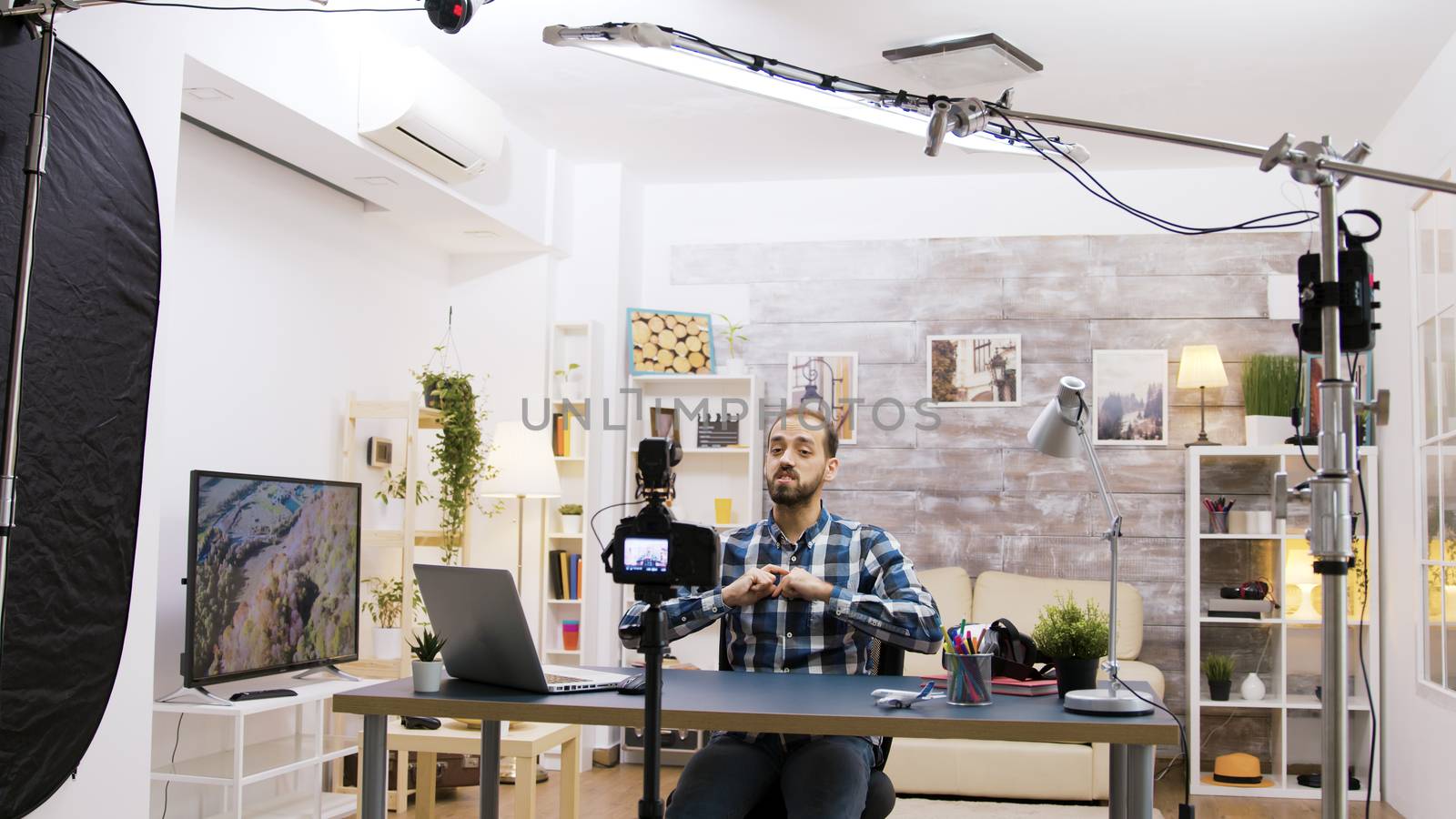 Behind the scenes of young vlogger using modern technology by DCStudio