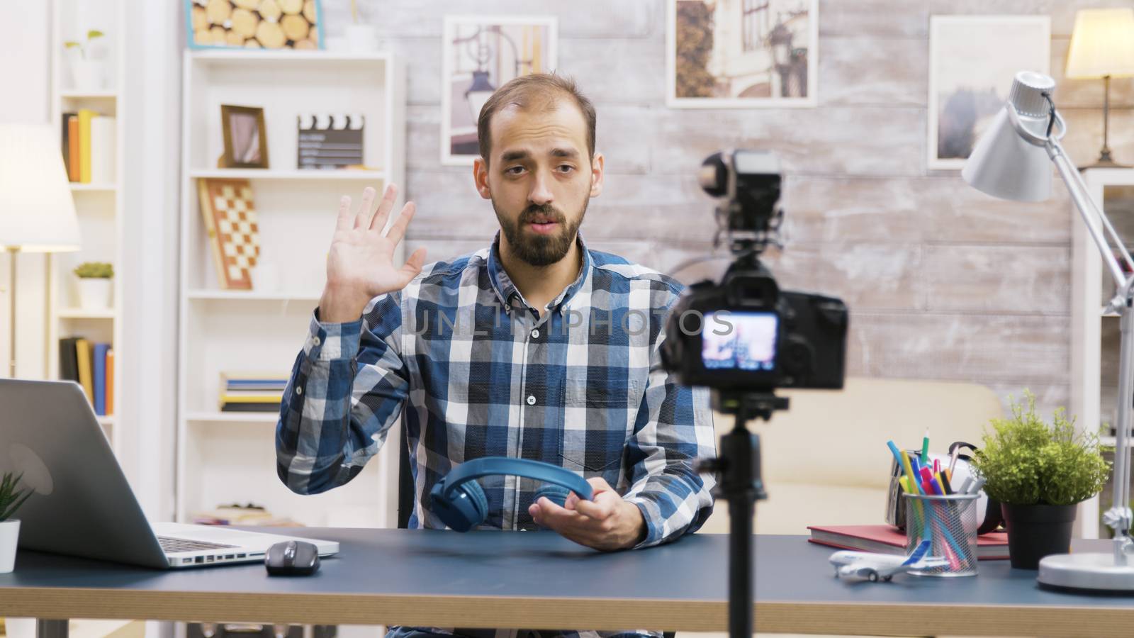 Famous influencer recording a review of a cool headphones by DCStudio