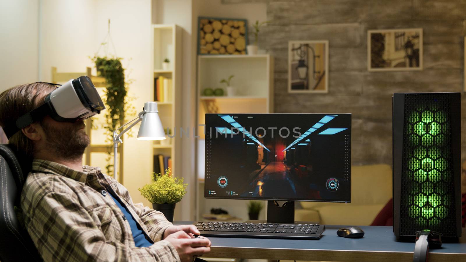 Man sitting on gaming chair playing video games using vr headset with wireless controller.