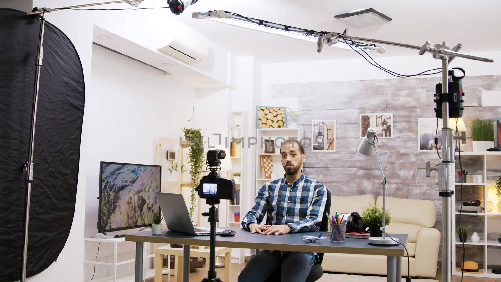Behind the scenes of young vlogger using modern technology by DCStudio