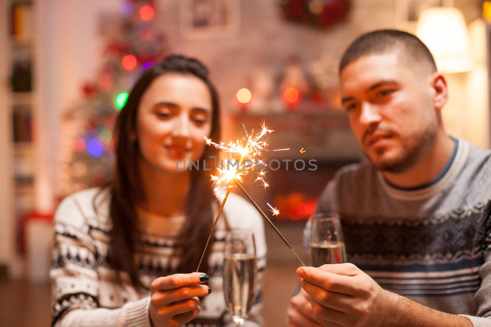 Happy couple on christmas day by DCStudio