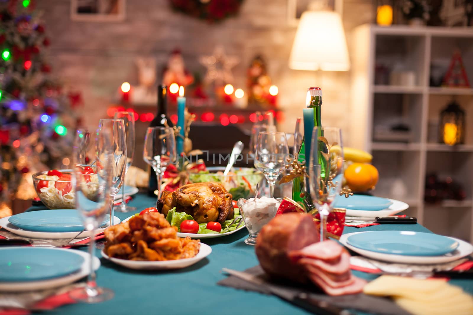 Delicious roasted chicken on the table for christmas celebration.