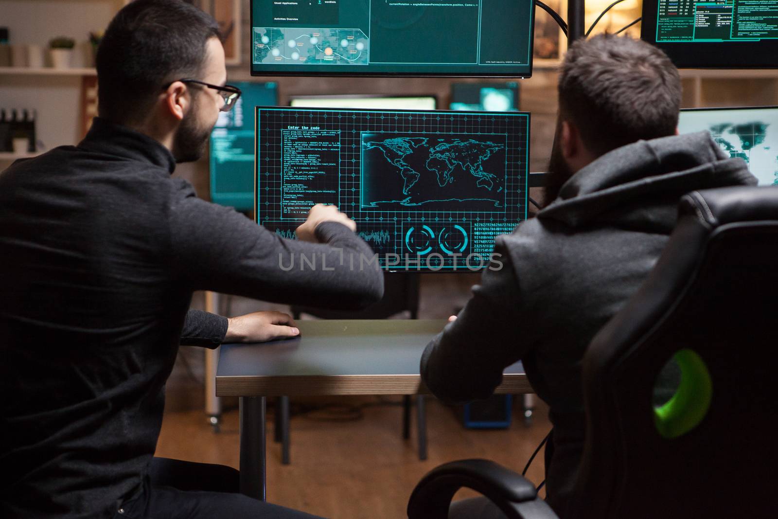 Team of hackers planning a cyber attack using a dangerous malware.