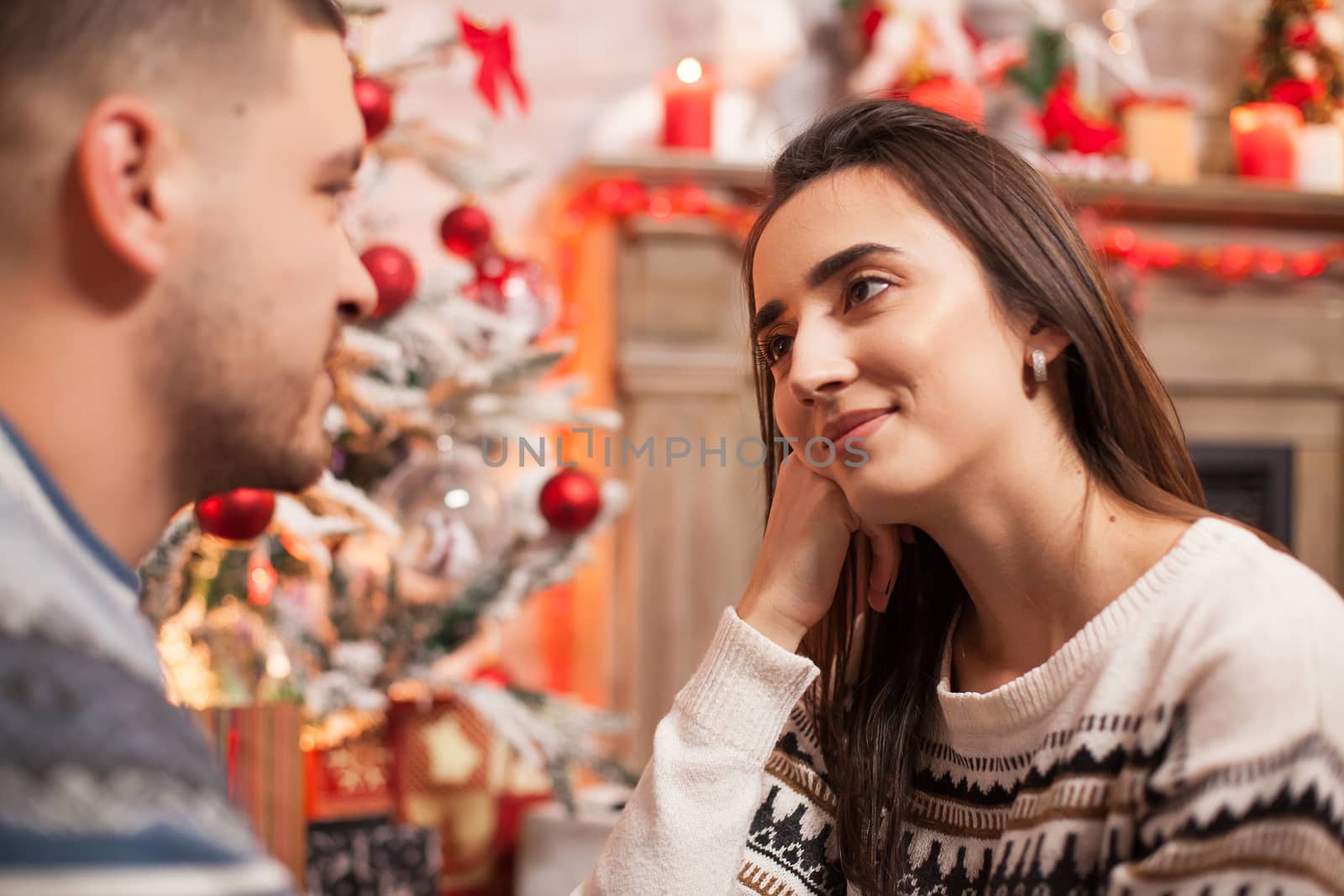 Girl in so much in love with her boyfriend. Celebrating christmas.