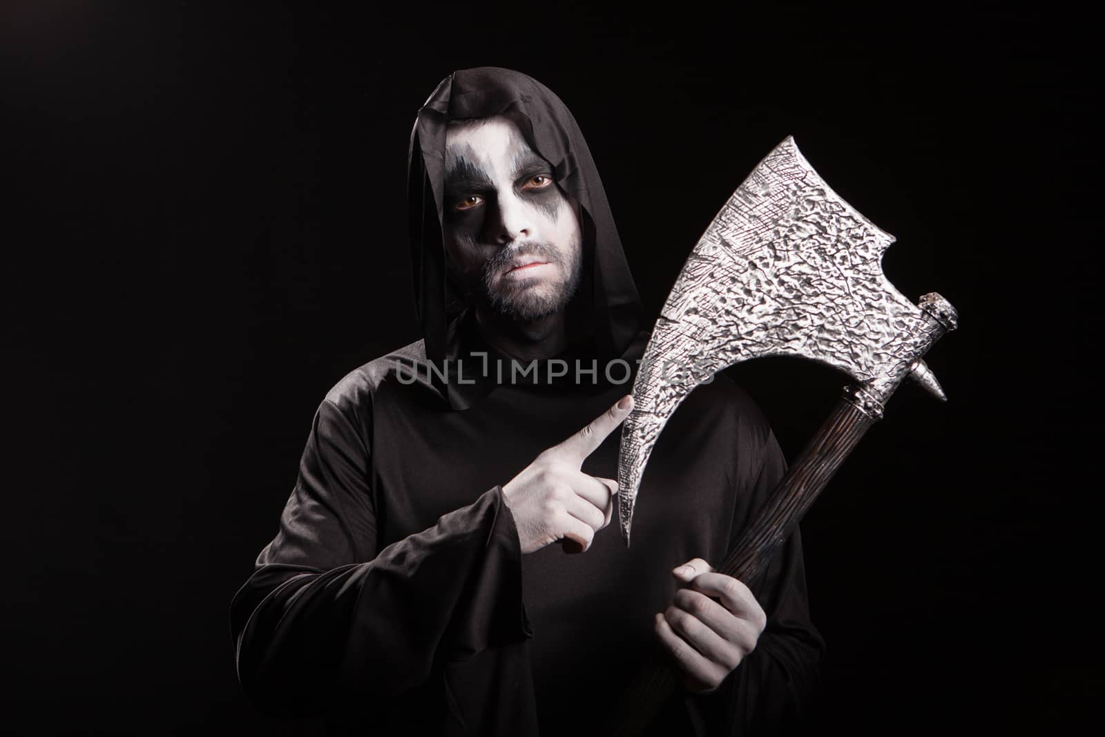 Dangerous scary man dressed up like grim reaper by DCStudio