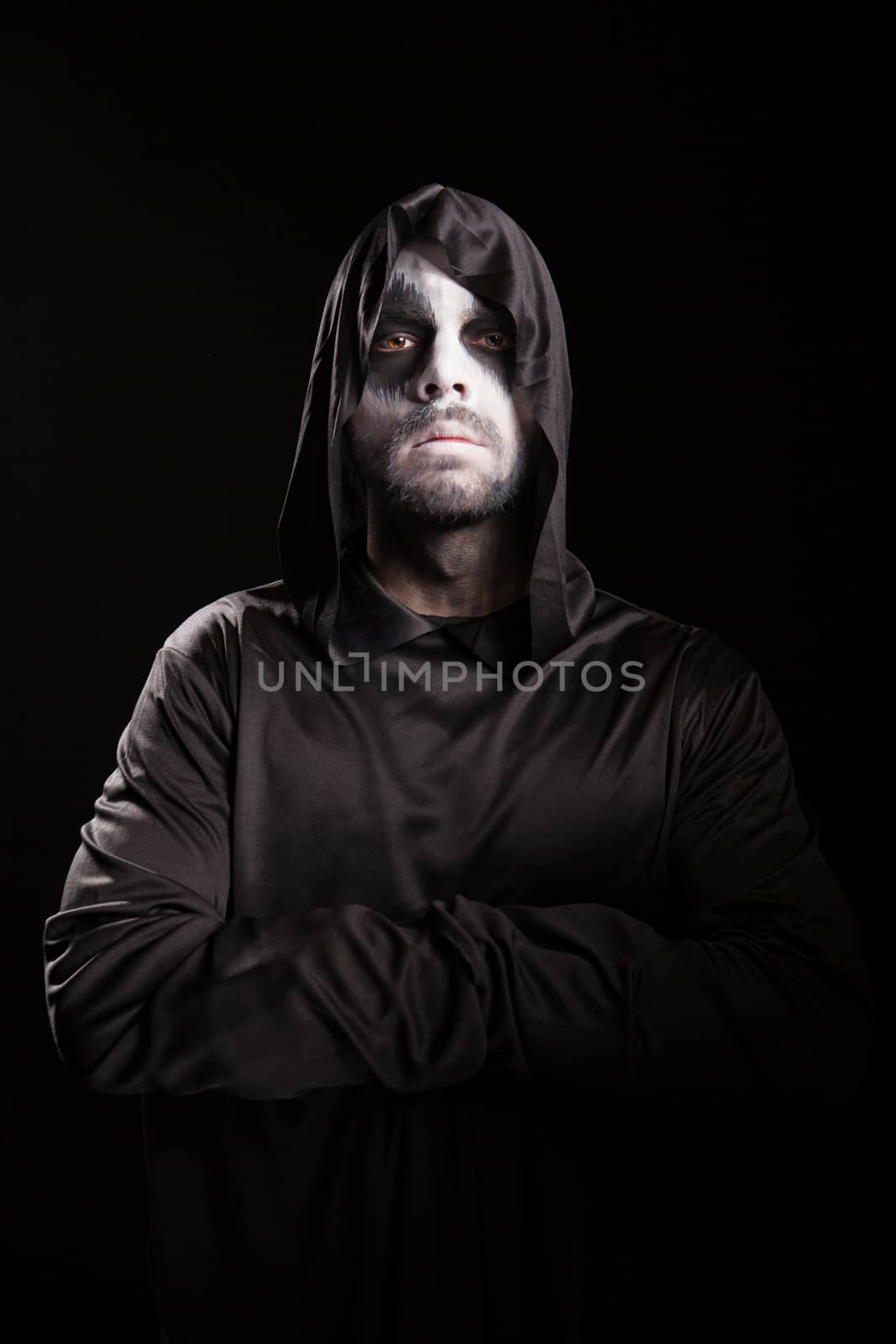 Portrait of grim reaper with hands crossed by DCStudio