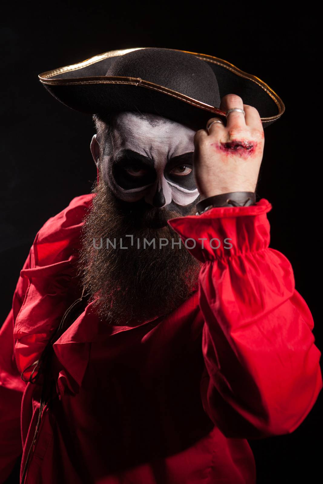 Spooky medieval pirate with blood on his hand by DCStudio