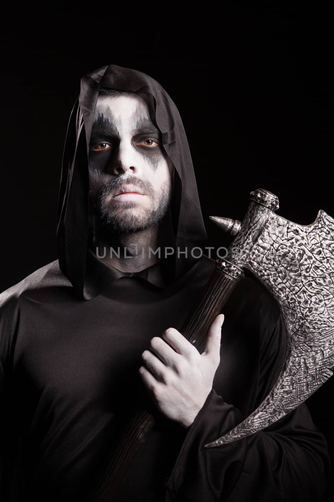 Dangerous grim reaper with a rope holding an axe by DCStudio