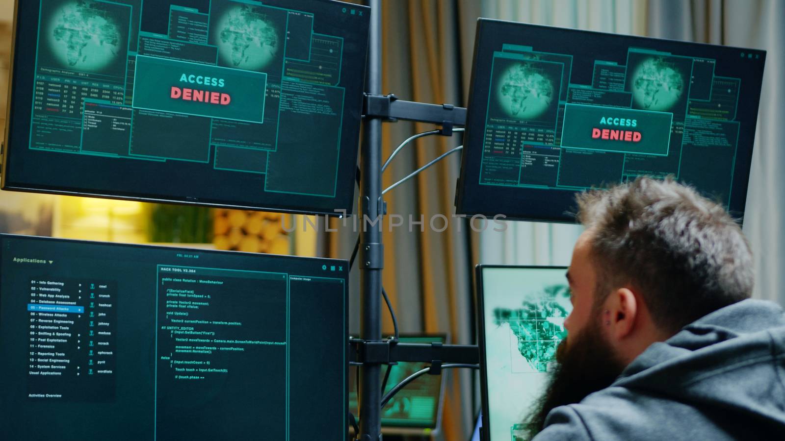 Zoom in shot of male hacker trying to hack a firewall and gets access denied.