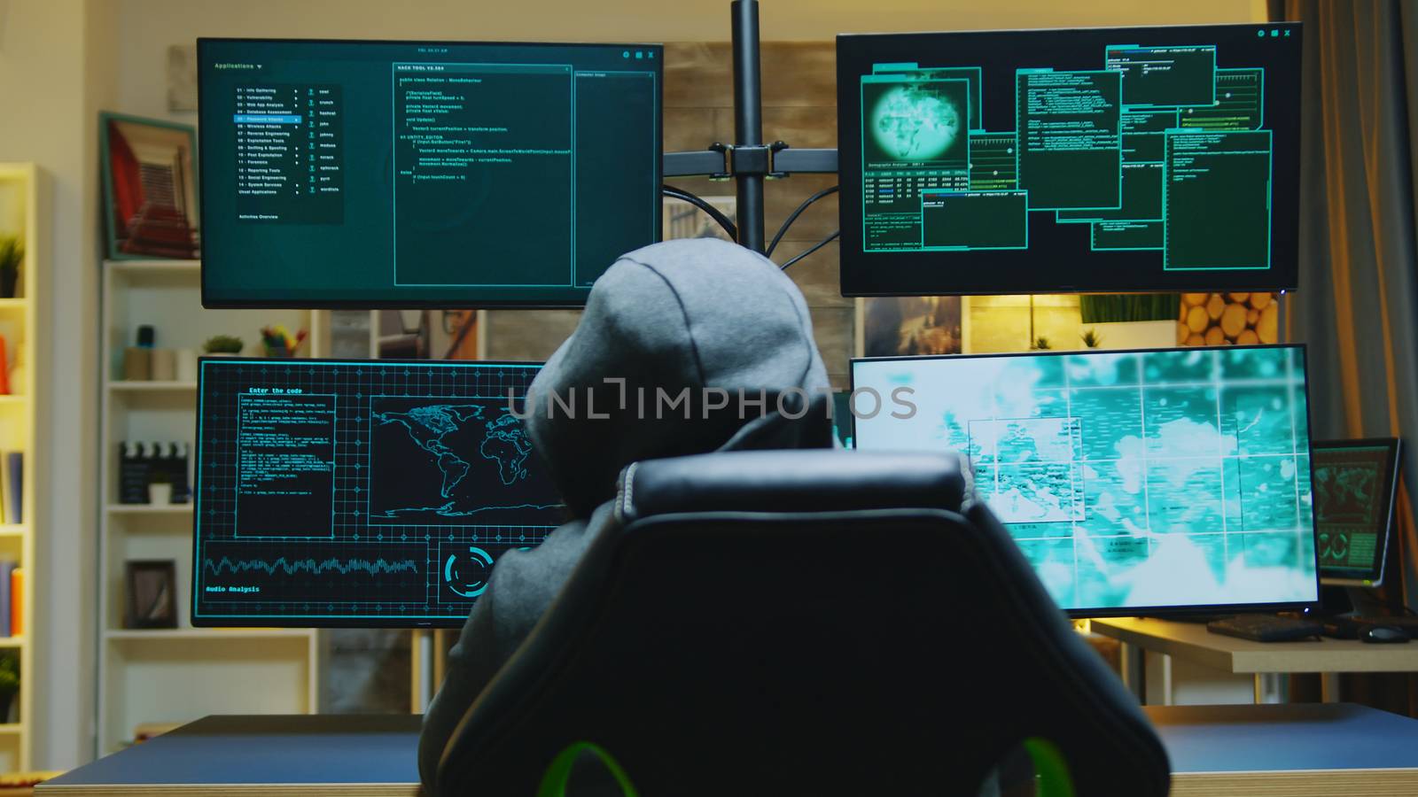 Hacker wearing a hoodie while committing cyber crimes by DCStudio