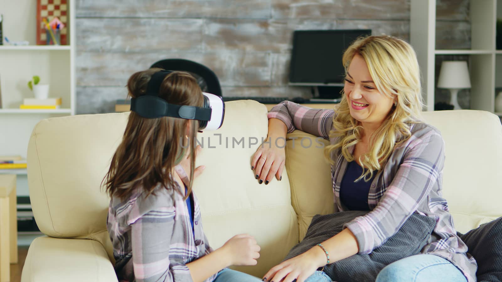 Excited little girl about her virtual reality headset by DCStudio