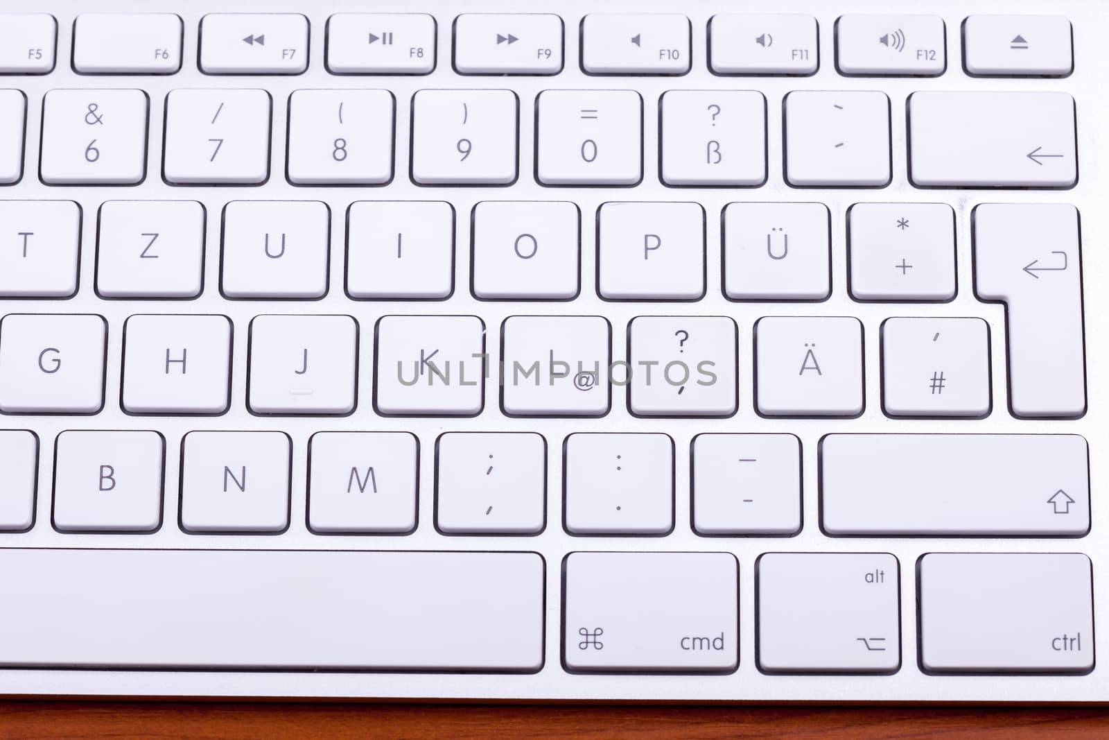 White aluminum keyboard in close up. Technology and communication