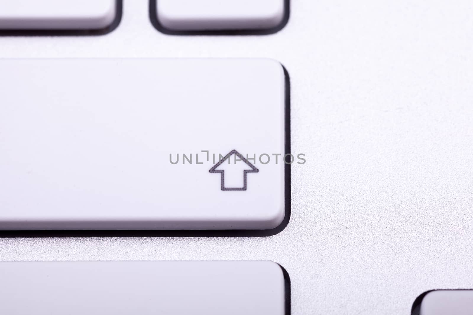 White aluminum keyboard in close up. Technology and communication