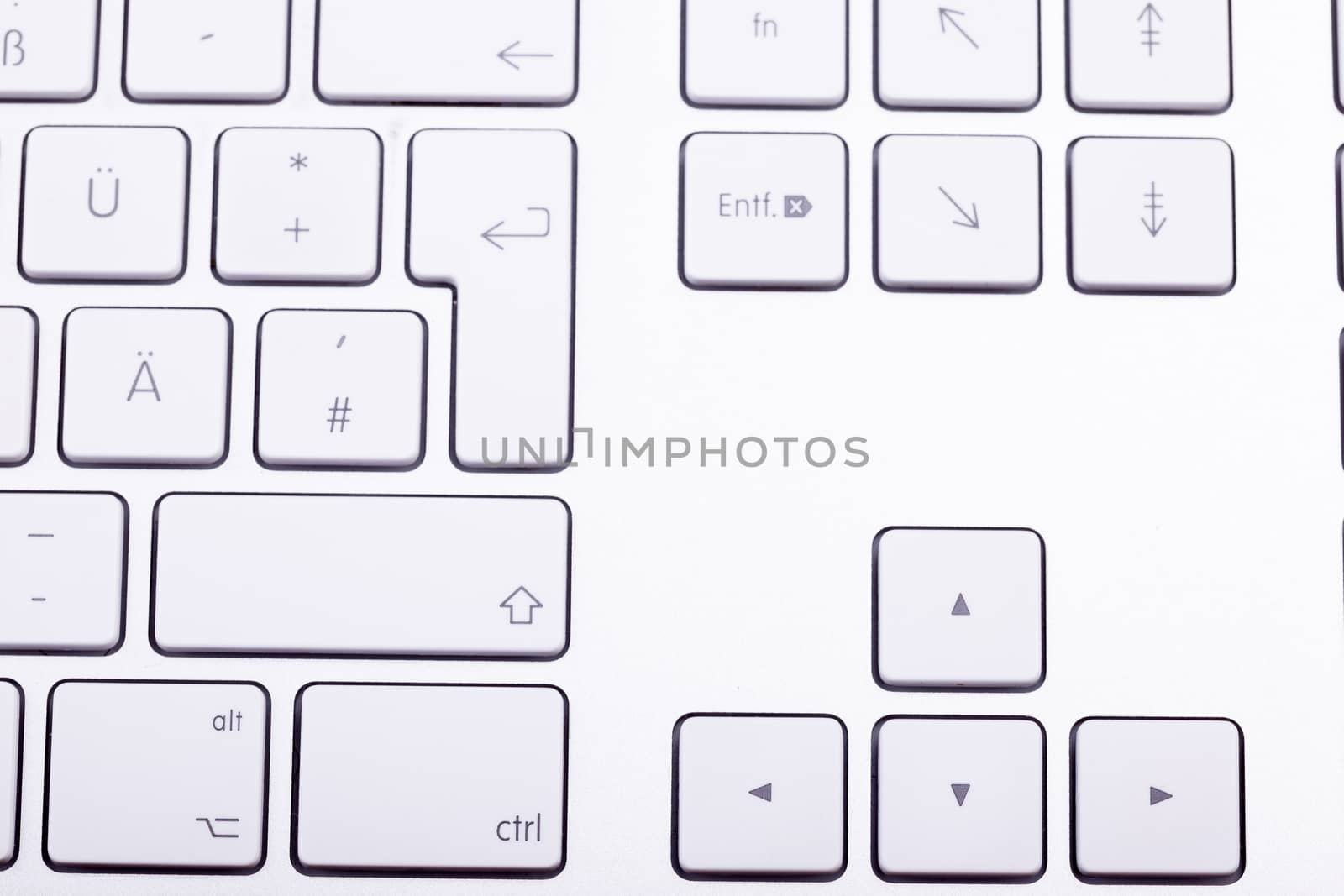 White aluminum keyboard in close up. Technology and communication