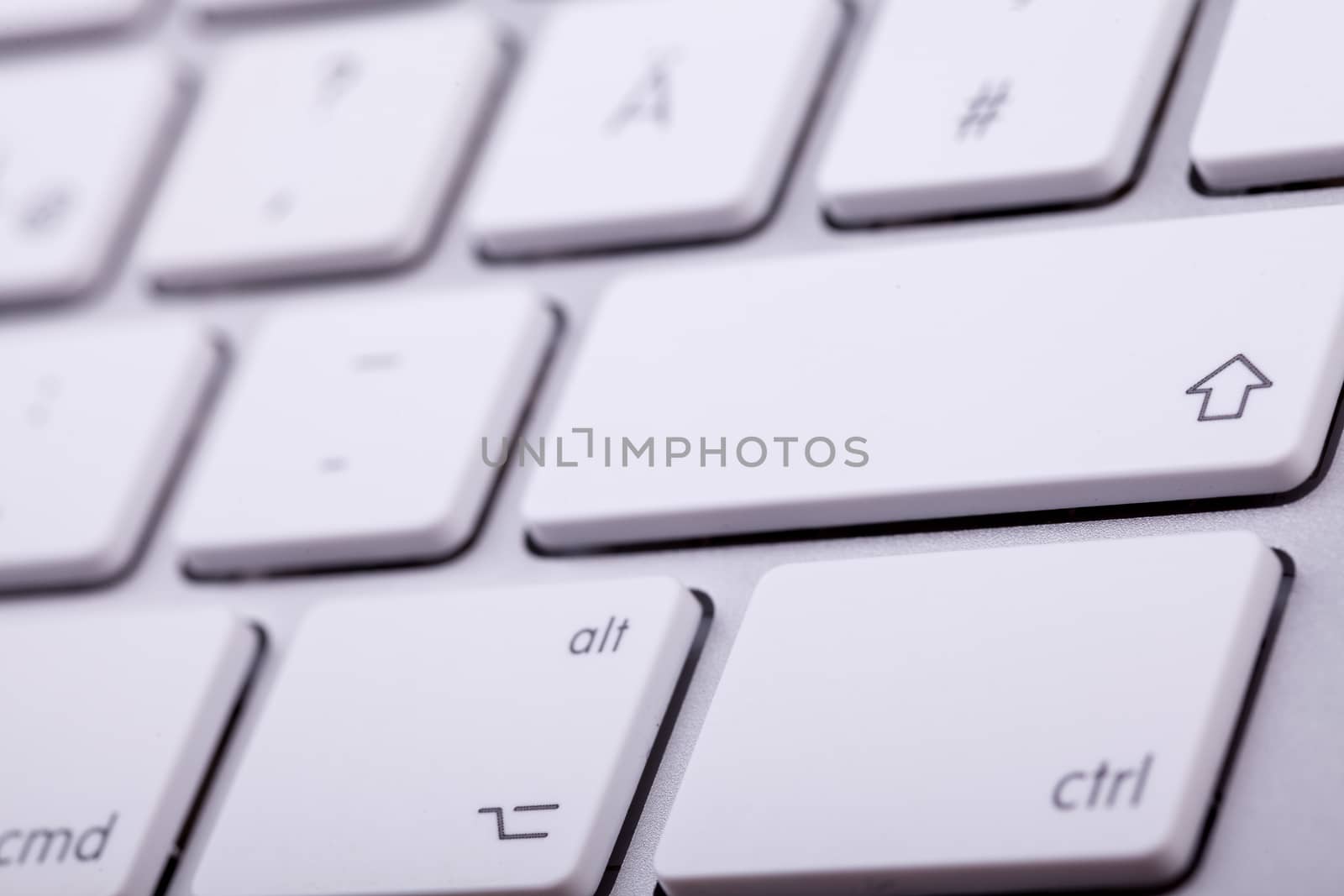 White aluminum keyboard in close up by DCStudio