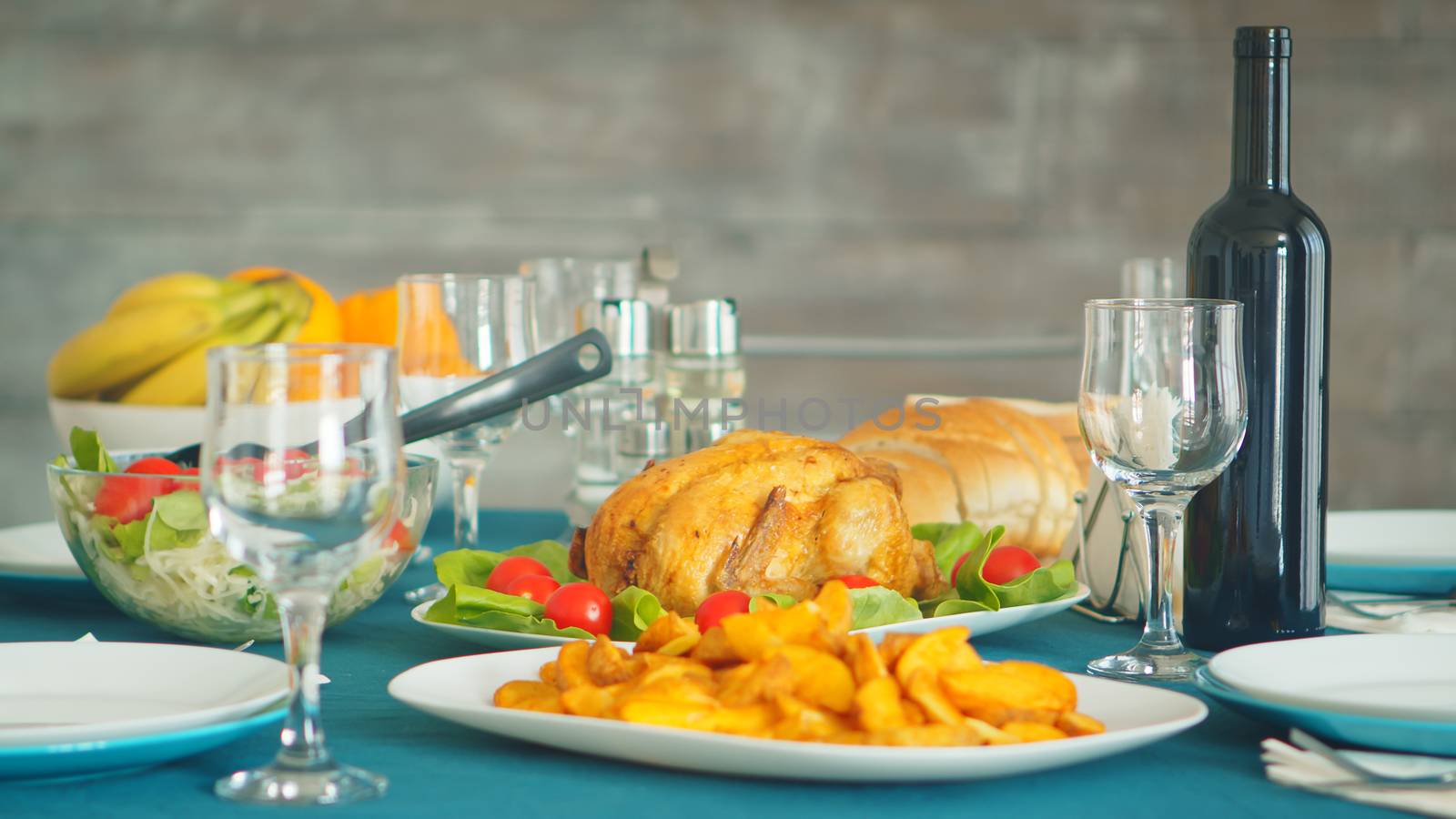 Delicious baked chicken on the table for family dinner.