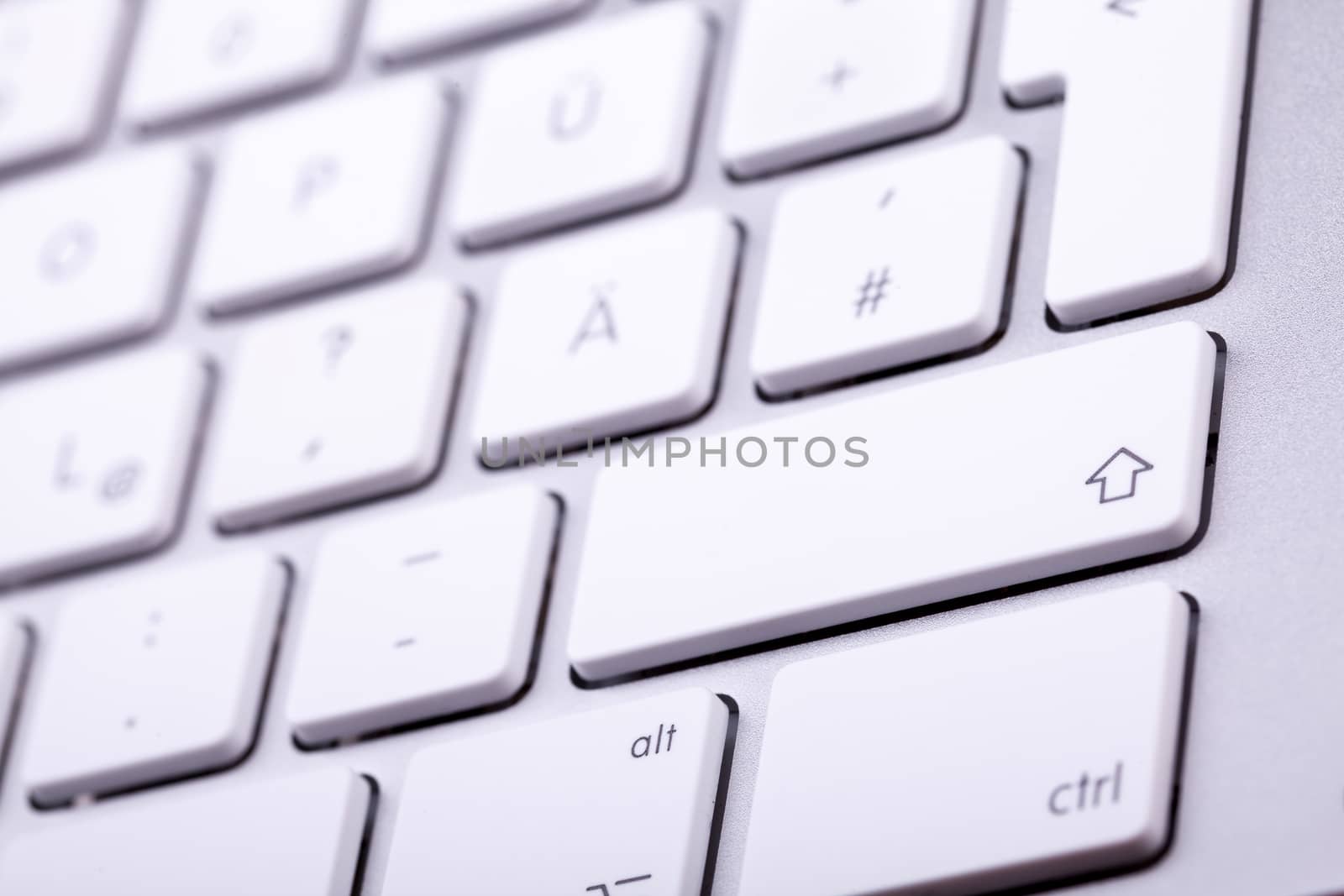 White aluminum keyboard in close up by DCStudio