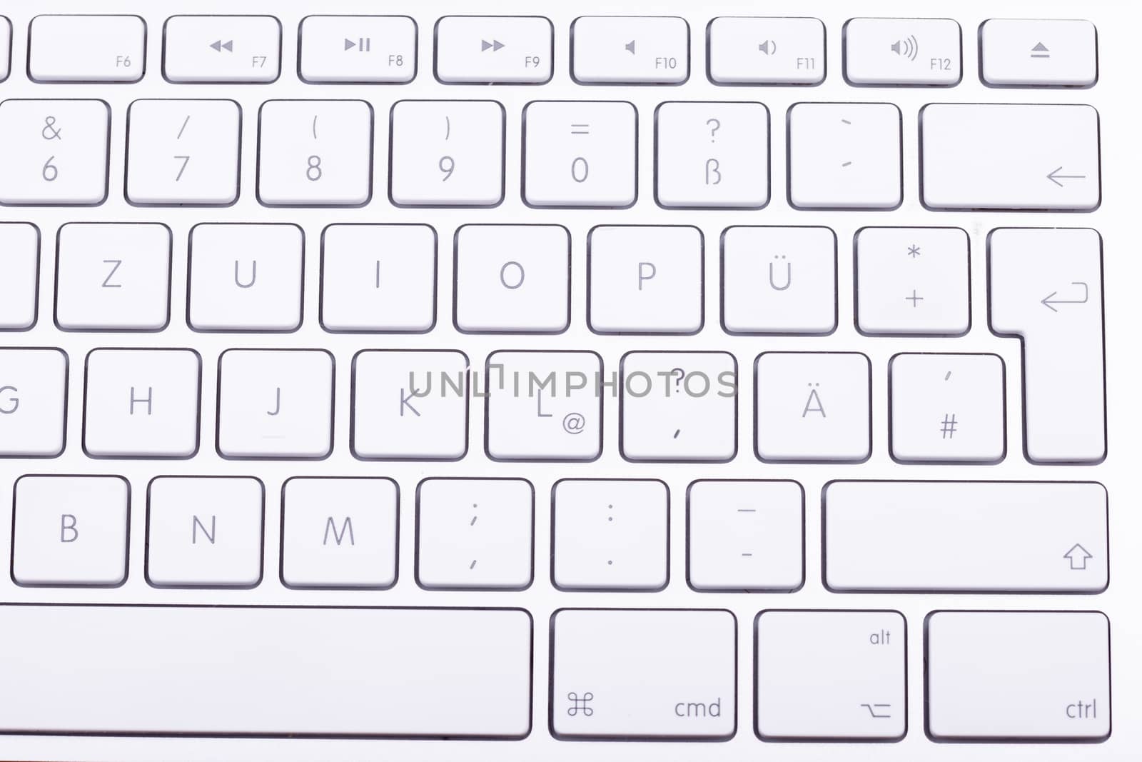 White aluminum keyboard in close up by DCStudio