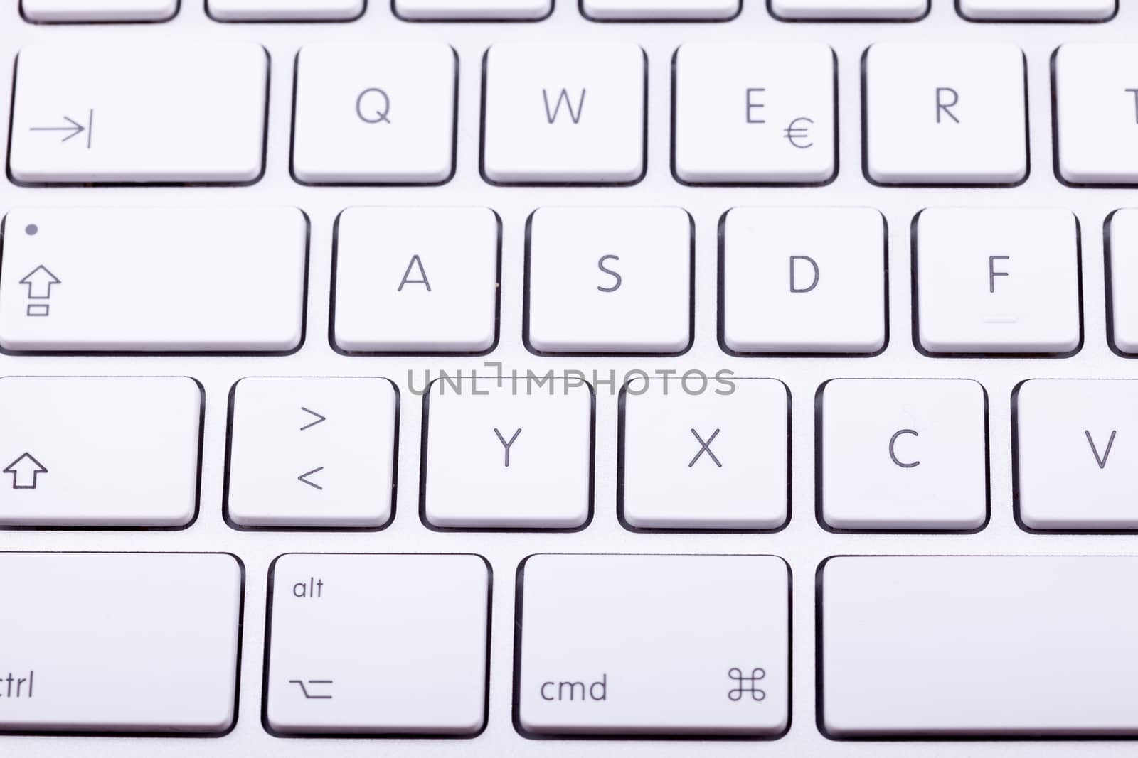 White aluminum keyboard in close up. Technology and communication