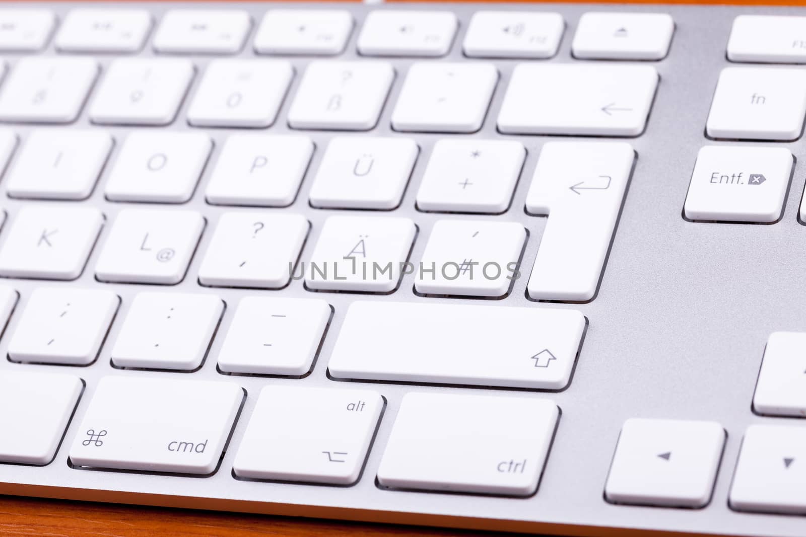 White aluminum keyboard in close up. Technology and communication