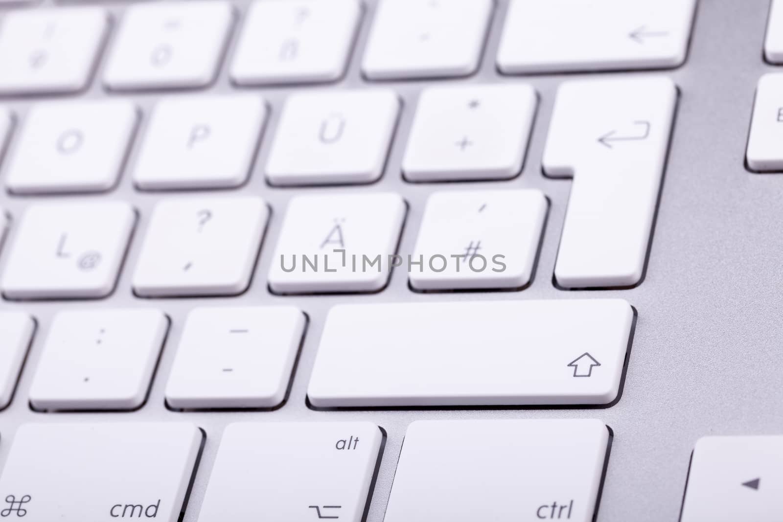 White aluminum keyboard in close up. Technology and communication