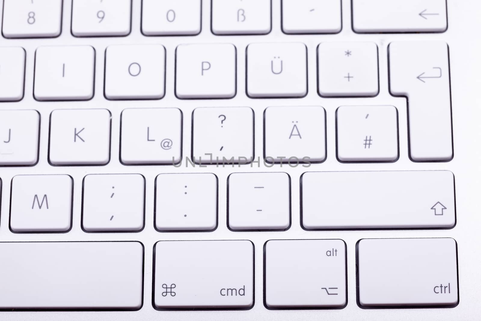 White aluminum keyboard in close up. Technology and communication