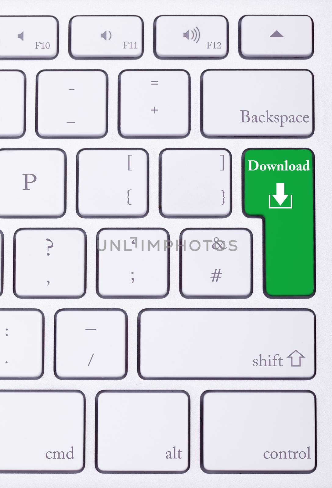 Green key with download word written on it. Digital data transfer