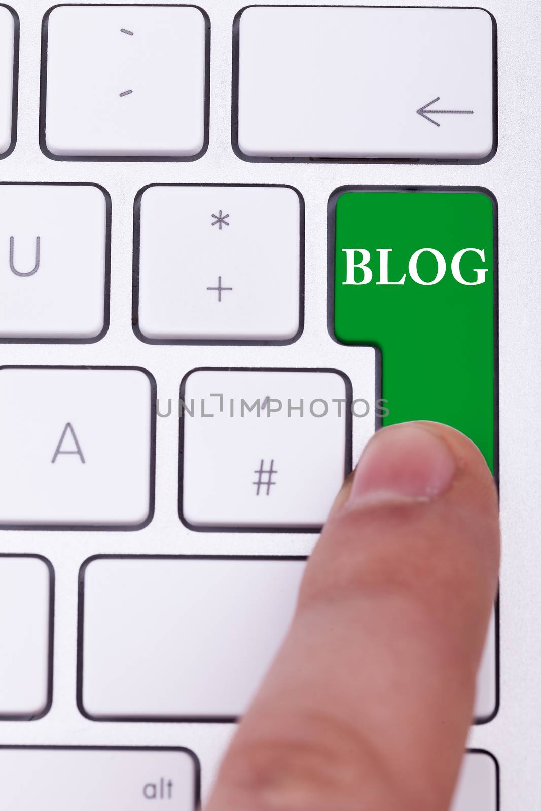 Pressing the blog button on keyboard. Blogging and writing online