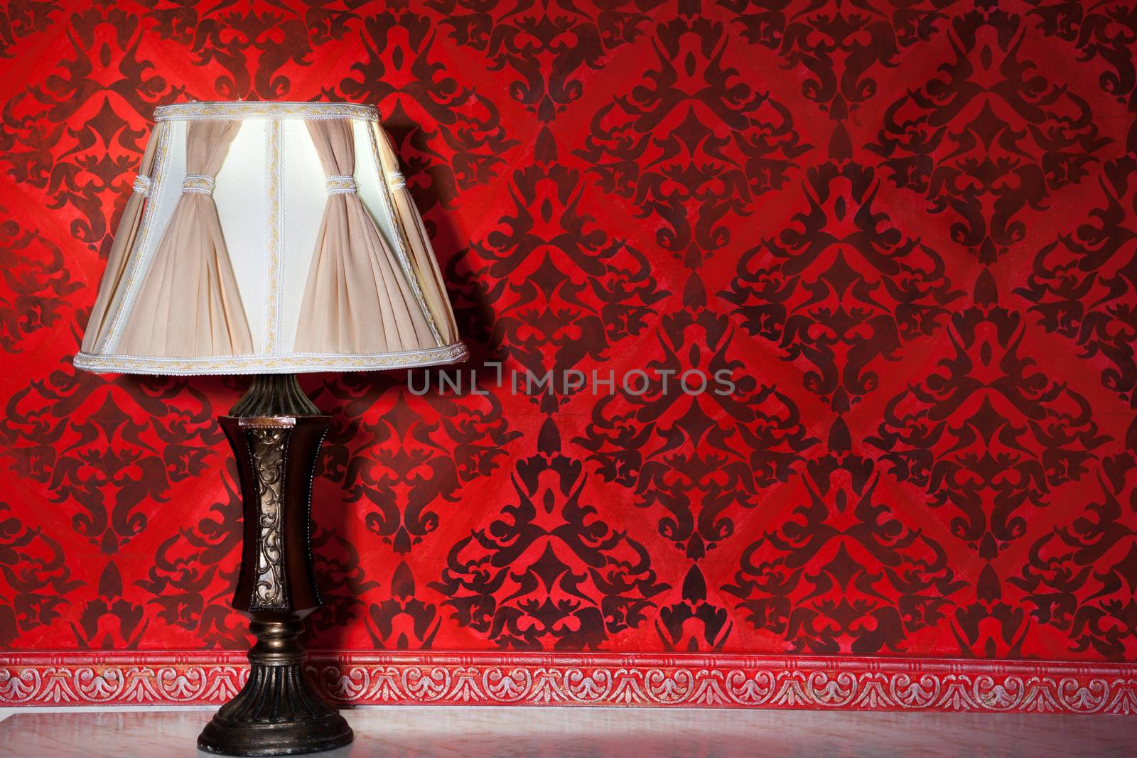 Vintage lamp in old interior from rococo period studio shooting