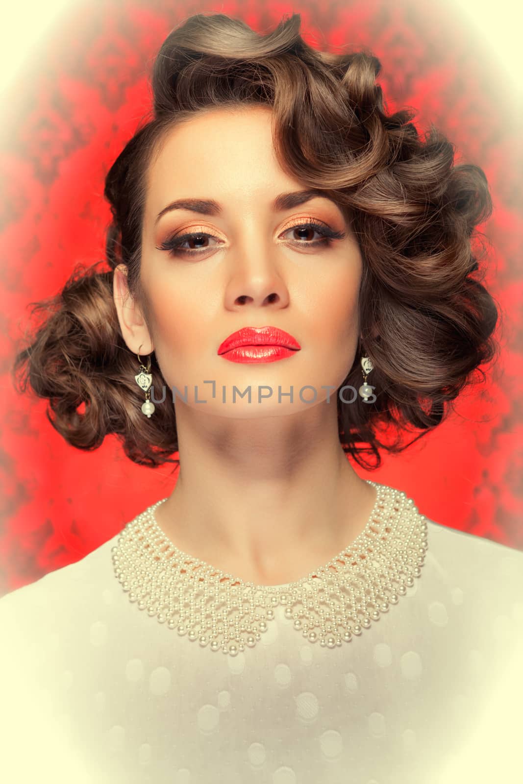 Retro style woman toned image on red vintage background by DCStudio