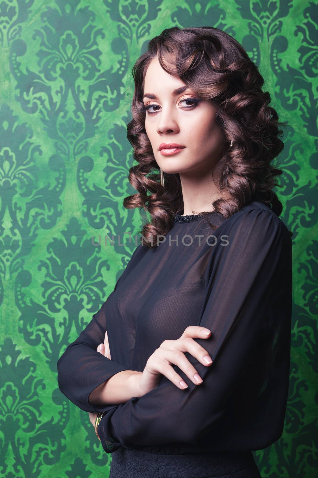 Sensual woman in green vintage room by DCStudio