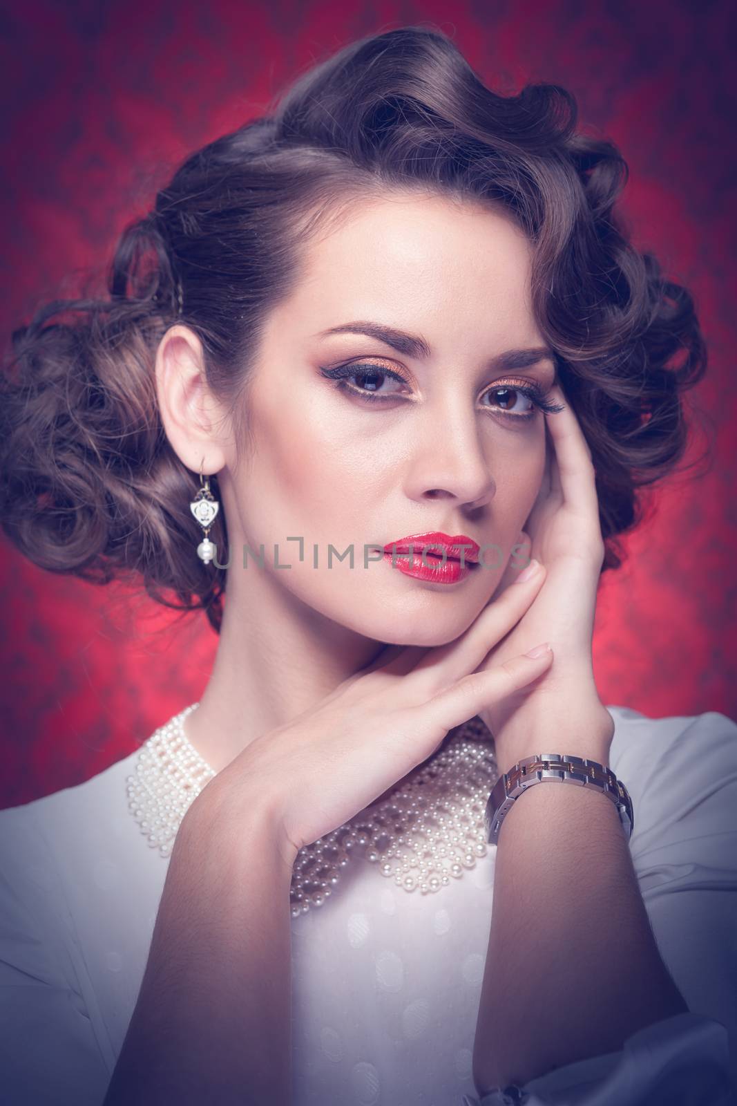Old fashioned woman toned image. Studio shooting. Professional make up and hairstyle