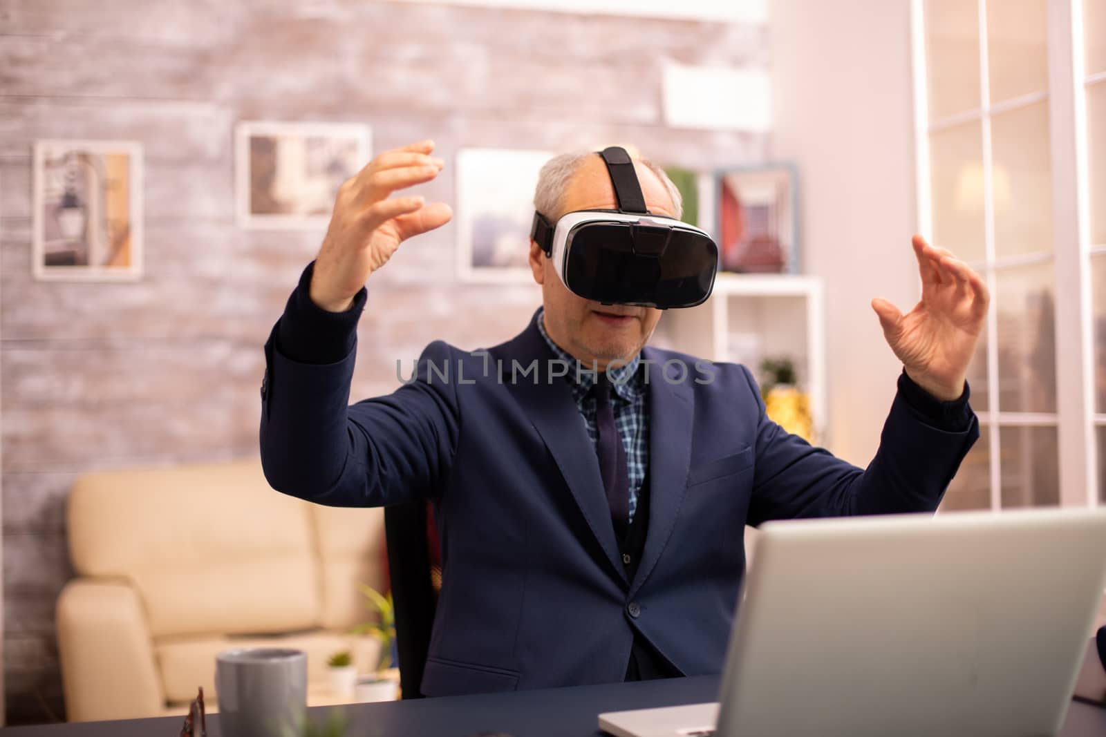 Elderly man experiencing new virtual reality technology for the first time in his home