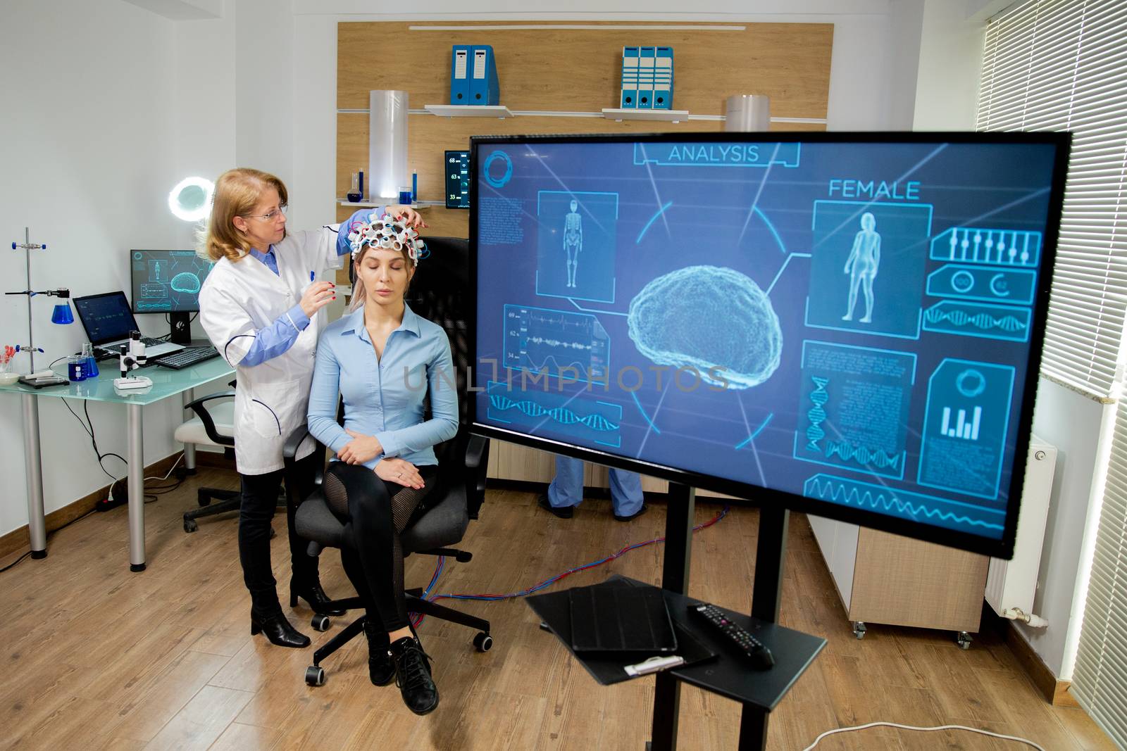Screen showing brain activity during scanning procedures. Neurological lab