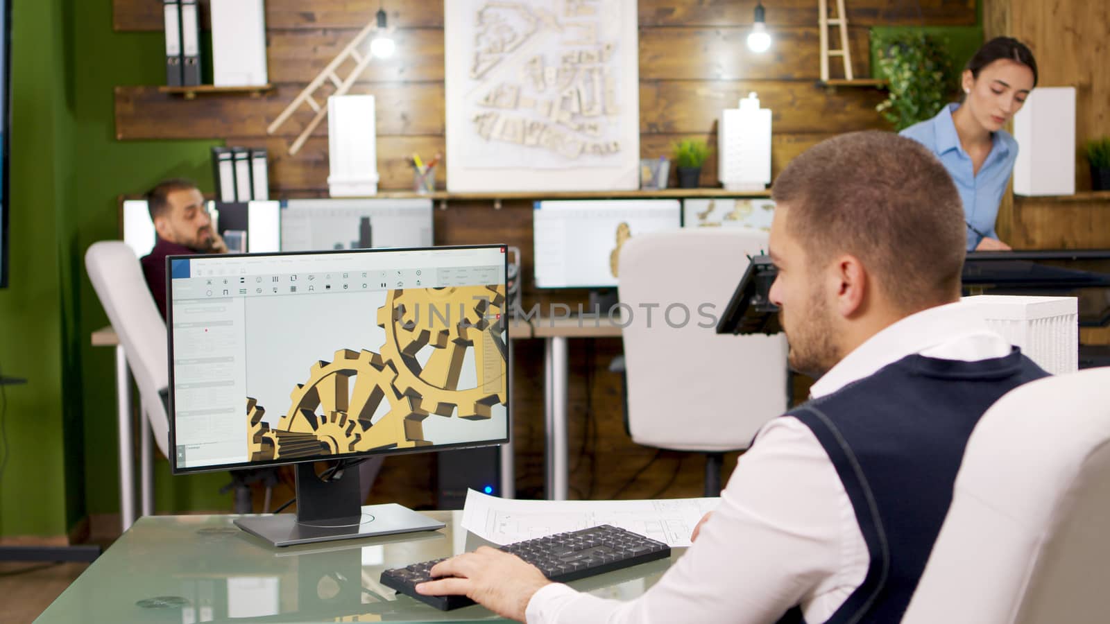 Construction engineer working on building mechanics on computer. Architect working on computer.