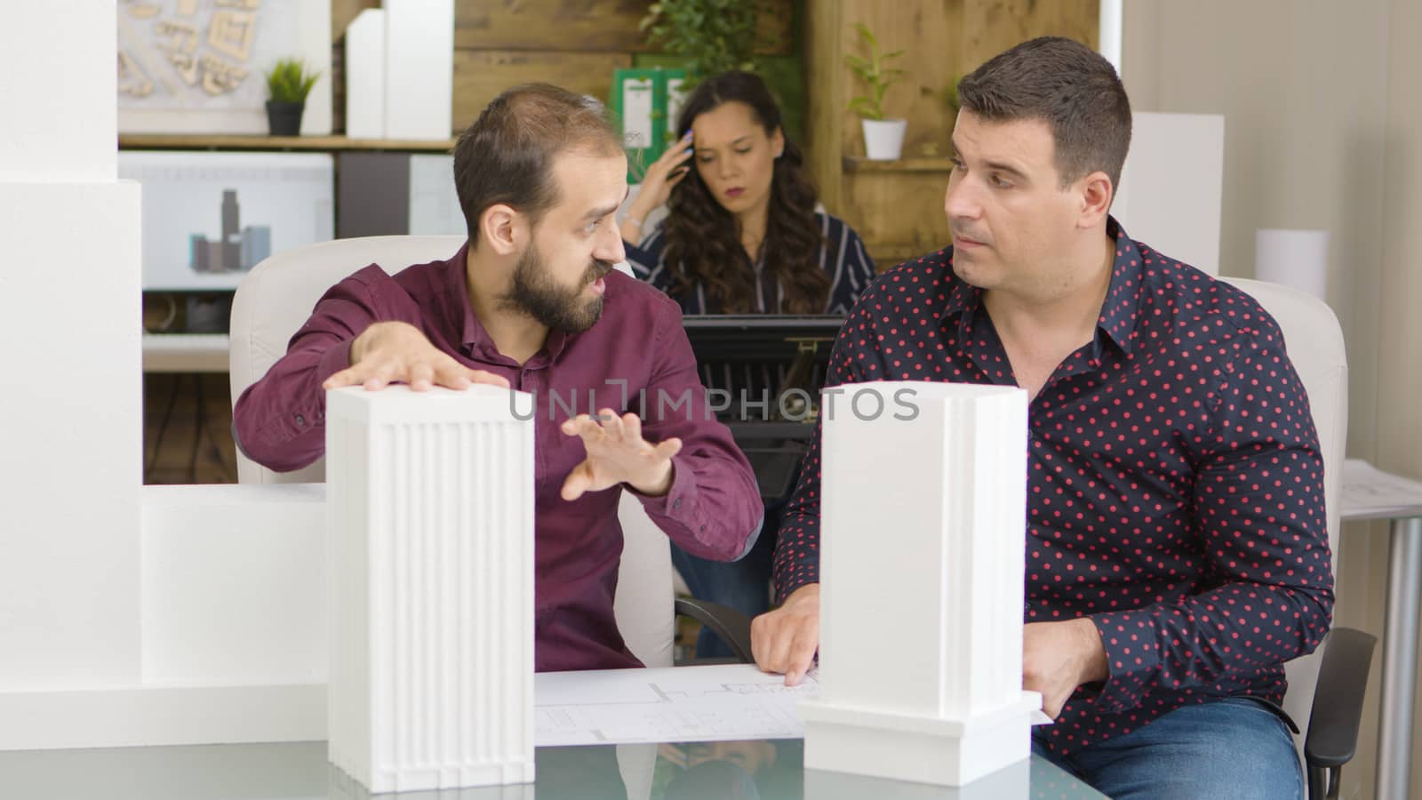 Architects and designers working on a new buildings project in modern office