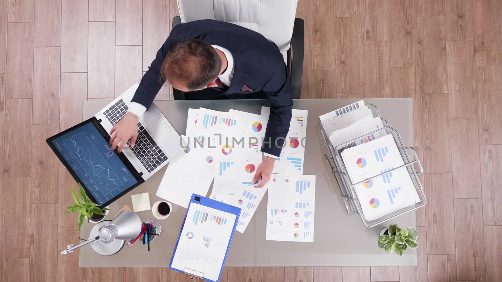 Top view of focused businessman in suit
