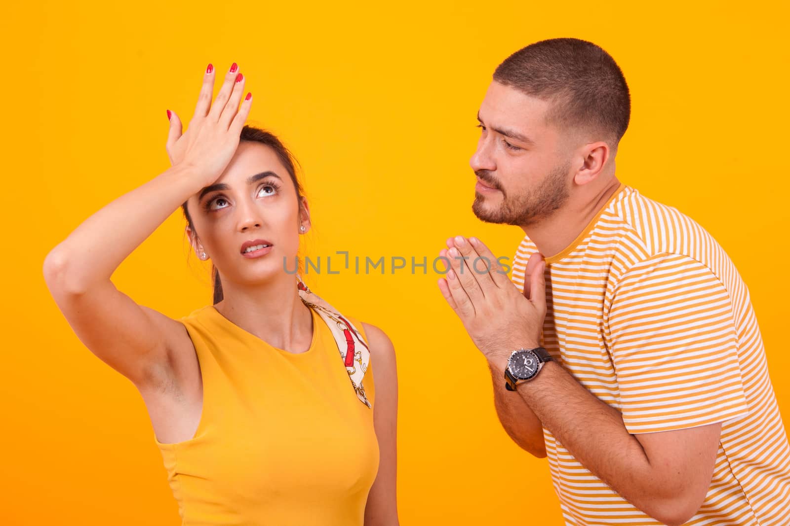 Boyfriend asking for forgiveness from his beautiful girlfriend. Relationship difficulties.