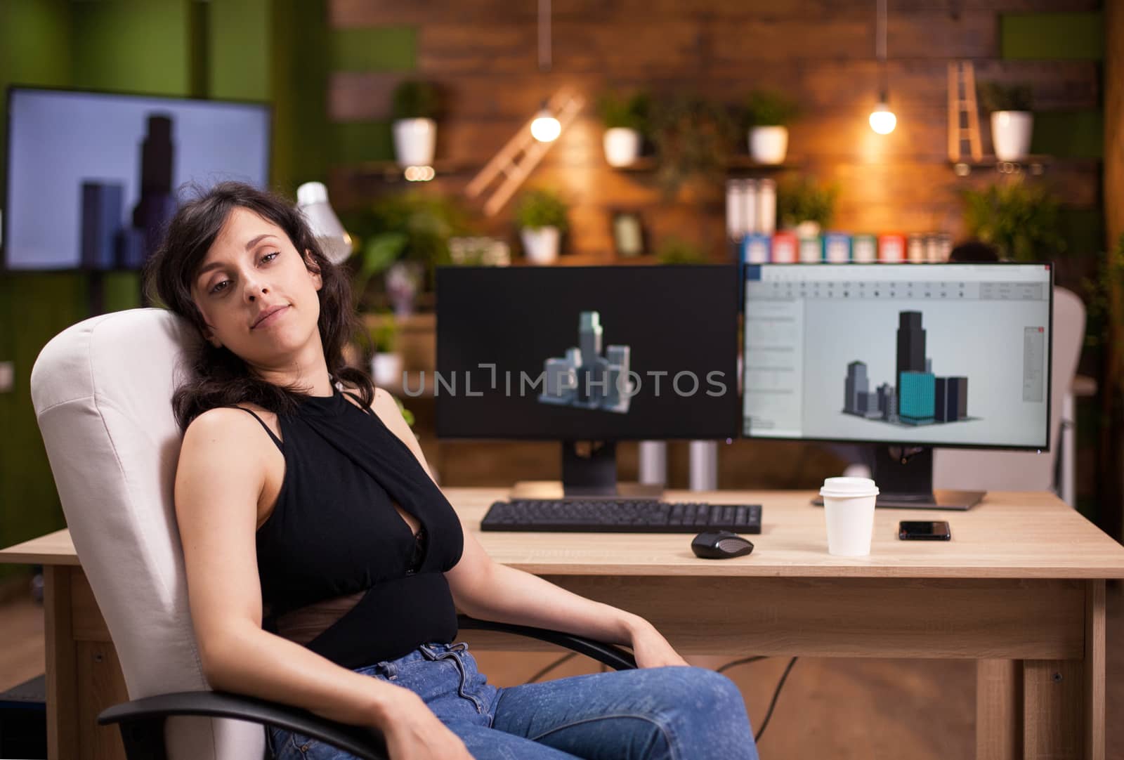 Portrait tired beautiful woman after a long day at her job. Young business woman. Company director.