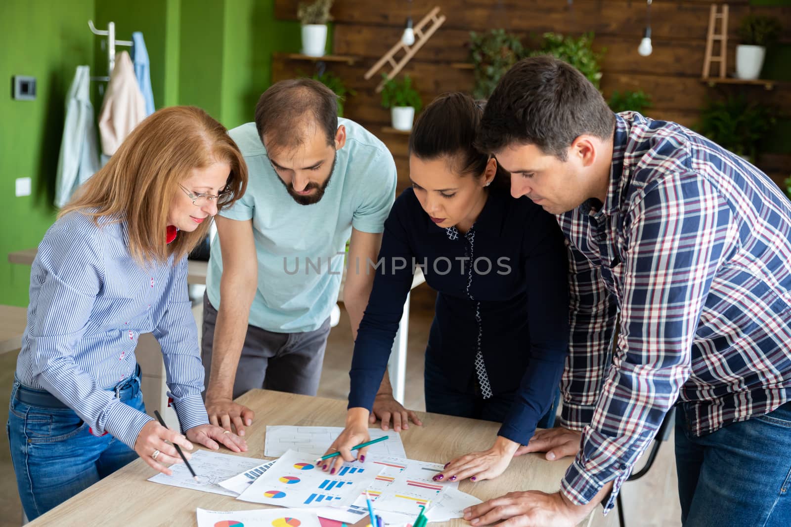 Young business team developing a big sale. Group discussion